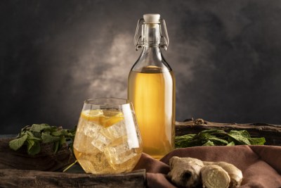 kombucha-bottle-glass-arrangement-still-life_400x267